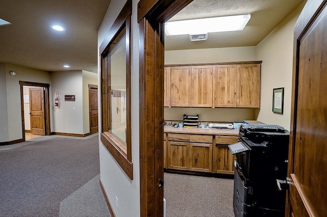 6701 N Idaho Rd, Newman Lake, WA 99025 - home office with light carpet, recessed lighting, and baseboards