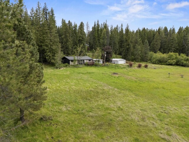2362 Nicholson Rd, Elk, WA 99009 - view of green lawn featuring a view of trees