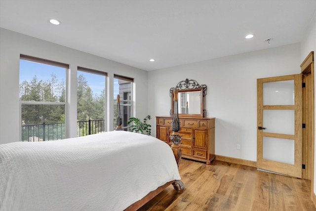 39980 Lake Summit Dr, Loon Lake, WA 99148 - bedroom with light wood-style floors, recessed lighting, and baseboards