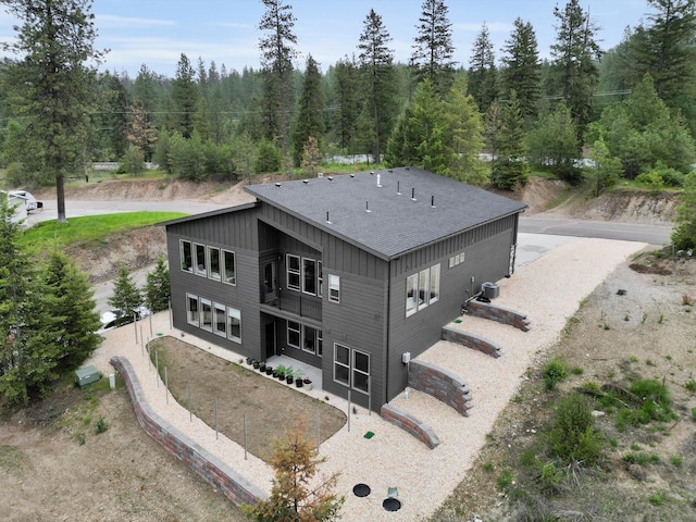 39980 Lake Summit Dr, Loon Lake, WA 99148 - aerial view of property and surrounding area with a heavily wooded area