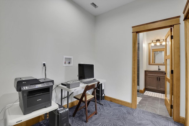 39980 Lake Summit Dr, Loon Lake, WA 99148 - office area featuring a sink and baseboards