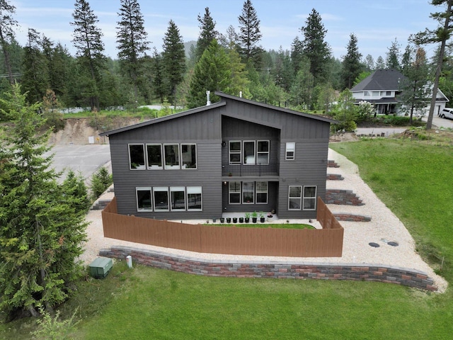 39980 Lake Summit Dr, Loon Lake, WA 99148 - rear view of property featuring a lawn