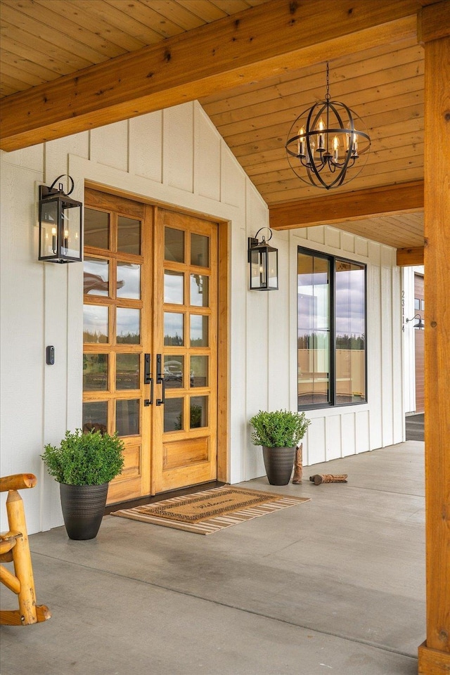 23114 W Mcfarlane Rd, Medical Lake, WA 99022 - view of exterior entry featuring french doors, board and batten siding, and a porch