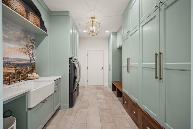 23114 W Mcfarlane Rd, Medical Lake, WA 99022 - laundry room with cabinet space, washing machine and dryer, recessed lighting, and a chandelier