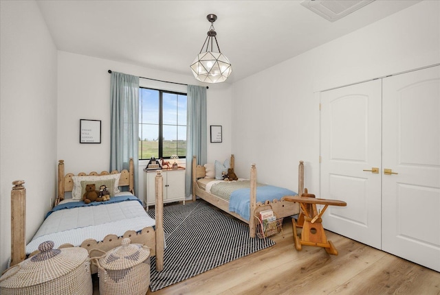 23114 W Mcfarlane Rd, Medical Lake, WA 99022 - bedroom with light wood-style floors and a closet