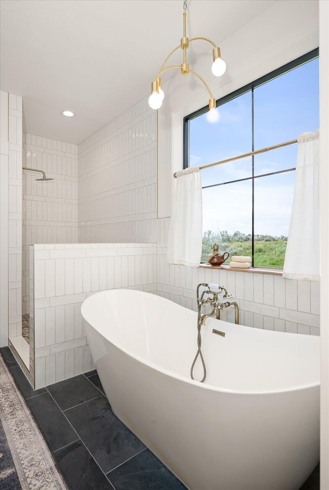 23114 W Mcfarlane Rd, Medical Lake, WA 99022 - bathroom featuring tile walls, a tile shower, a freestanding tub, tile patterned floors, and recessed lighting