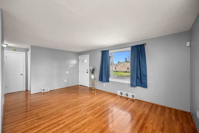 607 E Walton Ave, Spokane, WA 99207 - empty room with wood finished floors