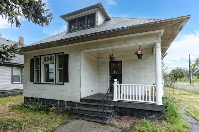 1608 E Pacific Ave, Spokane, WA 99202 - view of front of property featuring a porch and a shingled roof