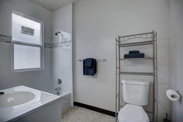 1608 E Pacific Ave, Spokane, WA 99202 - full bath with toilet, vanity, bathtub / shower combination, and baseboards