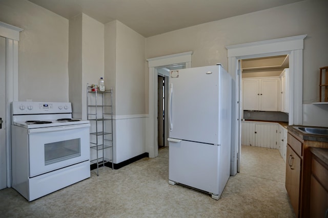 1608 E Pacific Ave, Spokane, WA 99202 - kitchen featuring white appliances and a sink