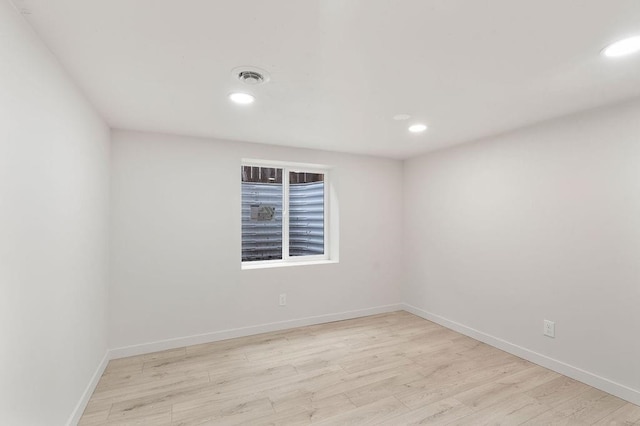 2417 E Nebraska Ave, Spokane, WA 99208 - spare room featuring wood finished floors, recessed lighting, and baseboards