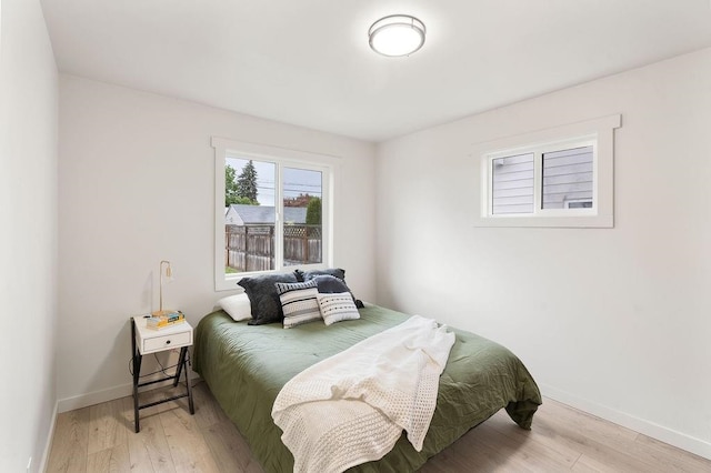 2417 E Nebraska Ave, Spokane, WA 99208 - bedroom with light wood-style floors and baseboards