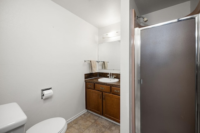 4796 W Gibson Dahl Rd, Clayton, WA 99110 - full bath with toilet, a shower stall, vanity, and baseboards