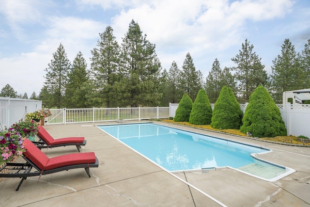 17110 W Boone Ln, Medical Lake, WA 99022 - view of swimming pool featuring a patio area, a fenced backyard, and view of scattered trees
