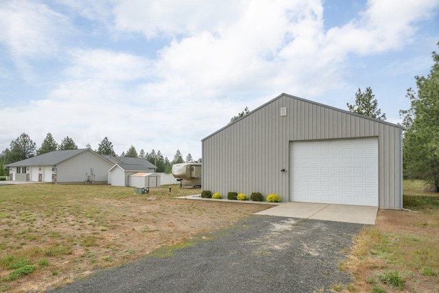 17110 W Boone Ln, Medical Lake, WA 99022 - view of side of property featuring a garage and driveway
