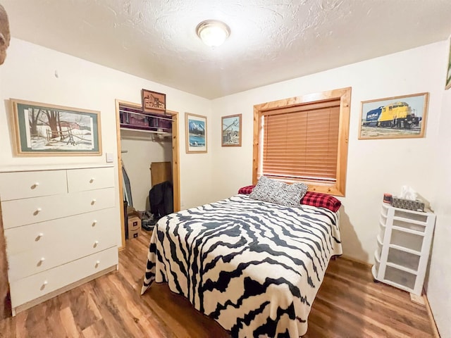 2010 Clemons Rd, Rice, WA 99167 - bedroom featuring wood finished floors and a closet
