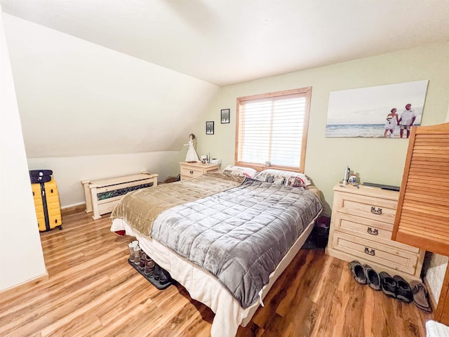 2010 Clemons Rd, Rice, WA 99167 - bedroom featuring wood finished floors and lofted ceiling