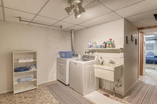 12820 E Sinto Ave, Spokane Valley, WA 99216 - washroom featuring washing machine and clothes dryer and baseboards