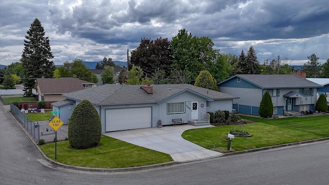 12820 E Sinto Ave, Spokane Valley, WA 99216 - ranch-style home with a garage, concrete driveway, and roof with shingles