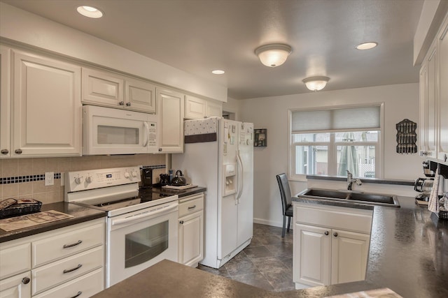 12820 E Sinto Ave, Spokane Valley, WA 99216 - kitchen featuring white appliances, a sink, dark countertops, backsplash, and recessed lighting