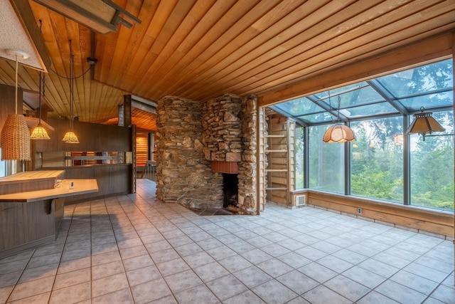 12515 E Apache Pass Rd, Spokane, WA 99206 - view of patio / terrace featuring a stone fireplace and a lanai