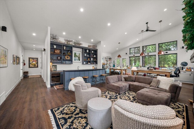 220 E Meadowlane Rd, Spokane, WA 99224 - living area with bar with sink, a ceiling fan, dark wood-style floors, wine cooler, and high vaulted ceiling