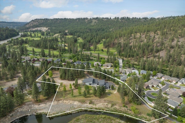 220 E Meadowlane Rd, Spokane, WA 99224 - aerial perspective of suburban area with a heavily wooded area and property parcel outlined