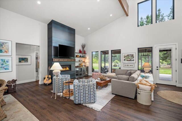 220 E Meadowlane Rd, Spokane, WA 99224 - living area featuring high vaulted ceiling, wood finished floors, a glass covered fireplace, plenty of natural light, and baseboards