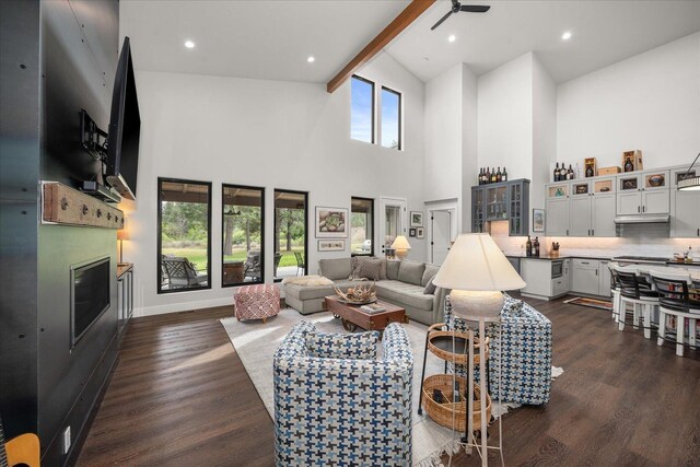 220 E Meadowlane Rd, Spokane, WA 99224 - living area featuring a fireplace, high vaulted ceiling, dark wood finished floors, baseboards, and ceiling fan