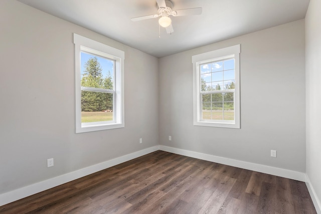 344 W Deer Park Milan Rd, Deer Park, WA 99006 - empty room with baseboards, dark wood-style flooring, and a ceiling fan