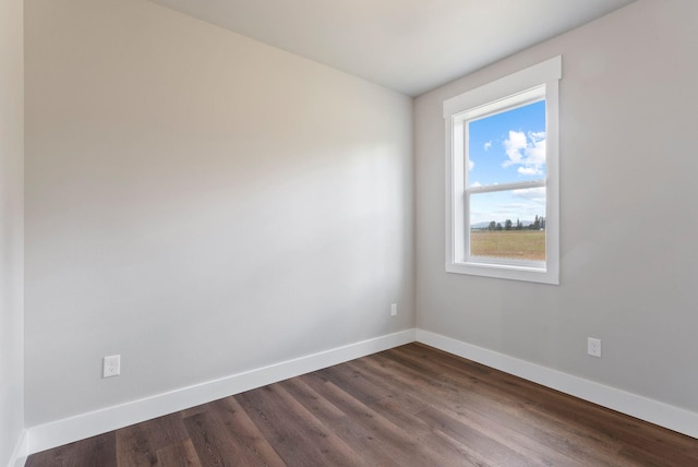 344 W Deer Park Milan Rd, Deer Park, WA 99006 - unfurnished room with baseboards and dark wood-style floors