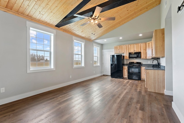 344 W Deer Park Milan Rd, Deer Park, WA 99006 - kitchen with black appliances, light brown cabinetry, wooden ceiling with exposed beams, dark countertops, and baseboards
