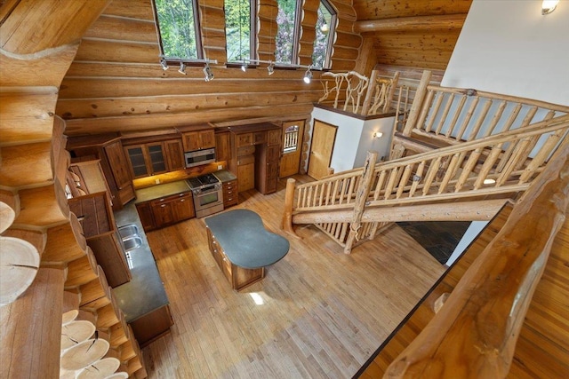 18109 N Harvard Ln, Newman Lake, WA 99025 - living area with rustic walls and light wood-style flooring