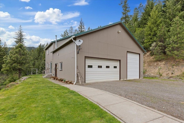 18109 N Harvard Ln, Newman Lake, WA 99025 - view of side of home featuring a lawn and a garage