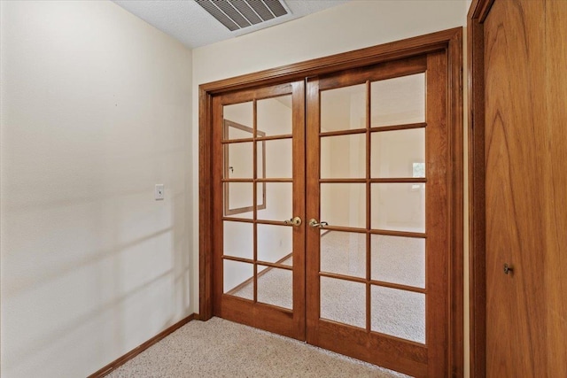 18109 N Harvard Ln, Newman Lake, WA 99025 - detailed view of french doors, carpet, and baseboards