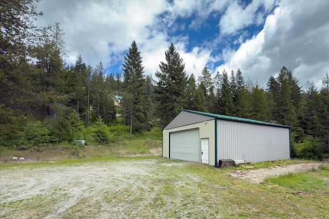 18109 N Harvard Ln, Newman Lake, WA 99025 - detached garage with a wooded view