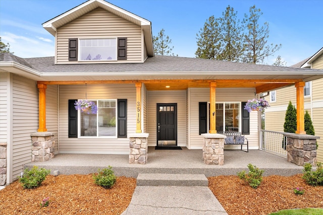 3515 W Excell Ln, Spokane, WA 99208 - view of front of house featuring a porch and a shingled roof