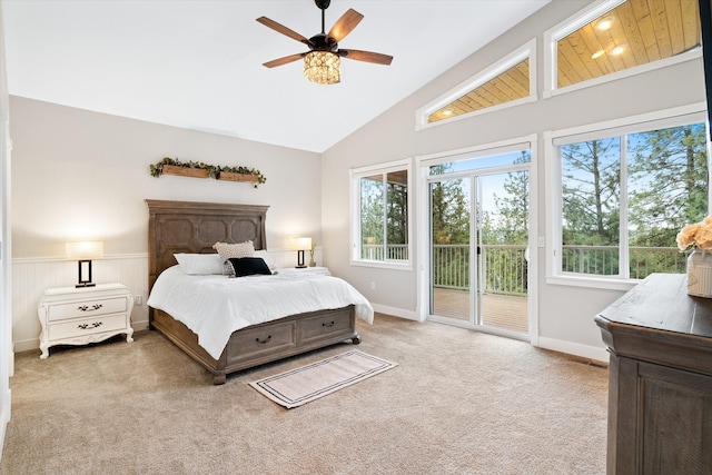 3515 W Excell Ln, Spokane, WA 99208 - carpeted bedroom featuring access to exterior, multiple windows, vaulted ceiling, ceiling fan, and baseboards