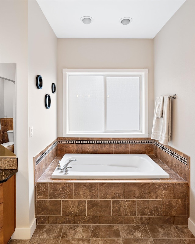 3515 W Excell Ln, Spokane, WA 99208 - bathroom with a garden tub and toilet