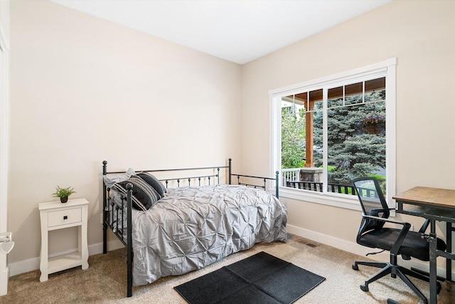 3515 W Excell Ln, Spokane, WA 99208 - bedroom featuring carpet flooring, baseboards, and an office area