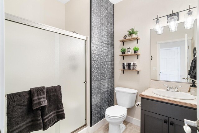 3515 W Excell Ln, Spokane, WA 99208 - bathroom with a stall shower, toilet, vanity, and baseboards