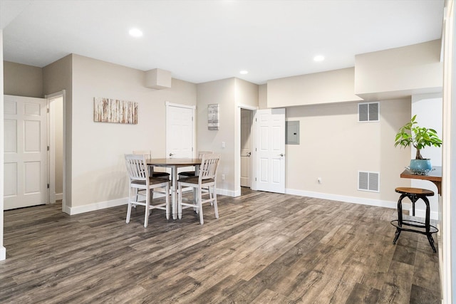 3515 W Excell Ln, Spokane, WA 99208 - dining space featuring dark wood-type flooring, baseboards, electric panel, and recessed lighting