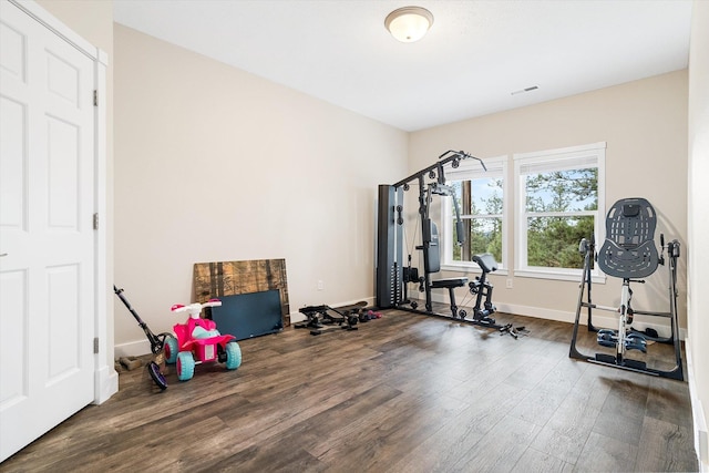 3515 W Excell Ln, Spokane, WA 99208 - exercise room featuring wood finished floors and baseboards