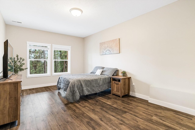 3515 W Excell Ln, Spokane, WA 99208 - bedroom featuring dark wood-style floors and baseboards