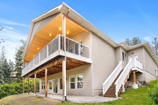 3515 W Excell Ln, Spokane, WA 99208 - back of property with a patio area and a yard