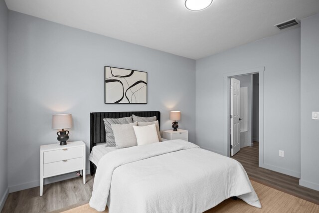 11911 N Main St, Mead, WA 99021 - bedroom with wood finished floors and baseboards