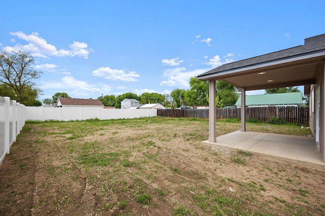 11911 N Main St, Mead, WA 99021 - fenced backyard featuring a patio