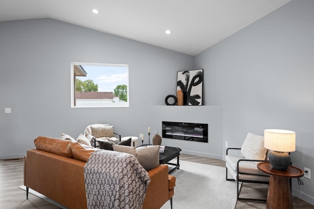 11911 N Main St, Mead, WA 99021 - living area featuring lofted ceiling, wood finished floors, recessed lighting, and baseboards