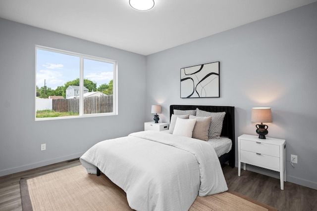 11911 N Main St, Mead, WA 99021 - bedroom featuring wood finished floors and baseboards