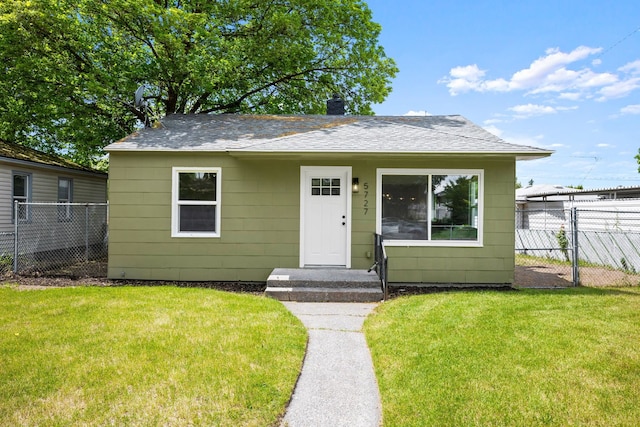 5727 N Cannon St, Spokane, WA 99205 - bungalow-style house with a shingled roof and a chimney